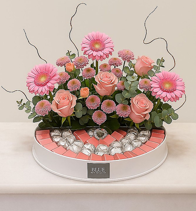 Flower arrangement with chocolate