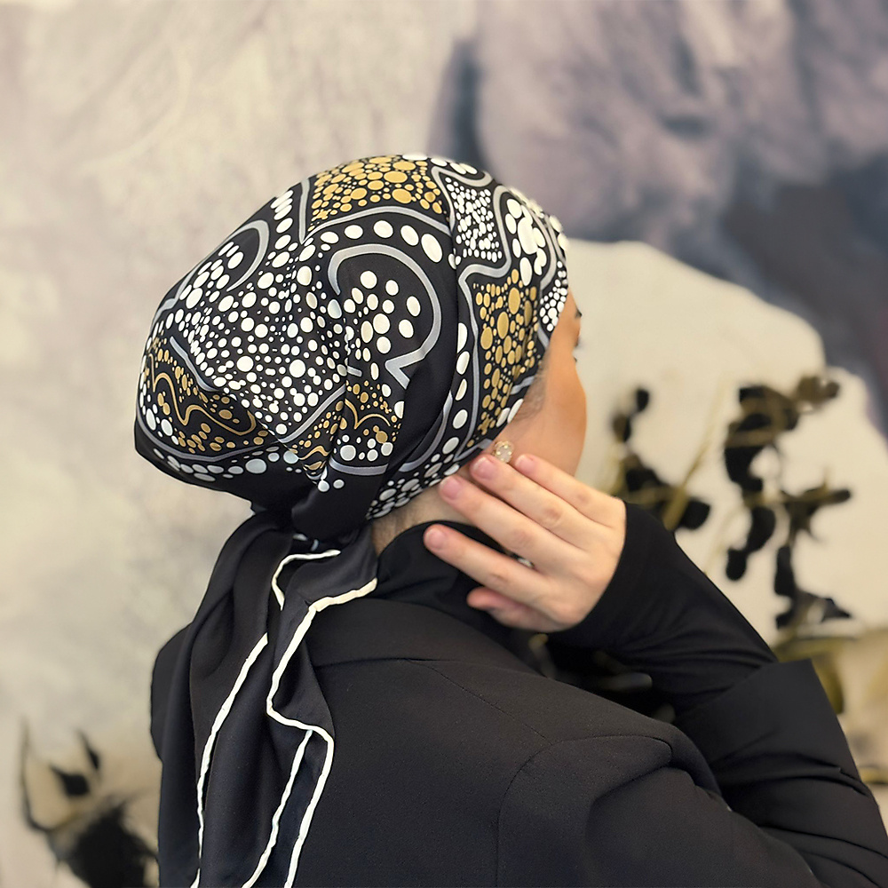 Black floral with white and yellow.