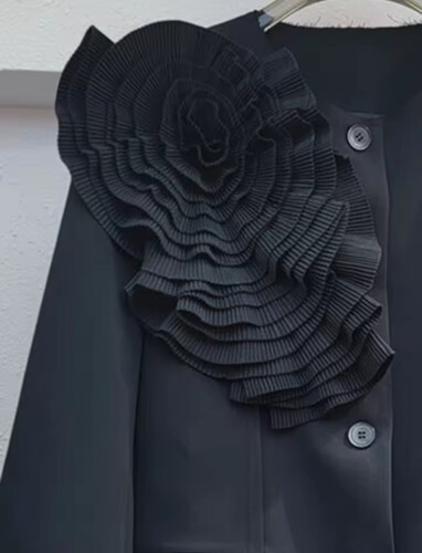 Black blazer flower