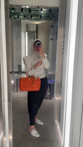 White blazer with belts