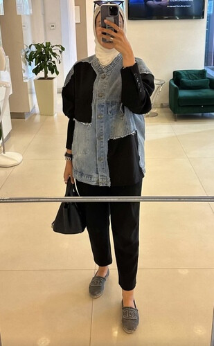Denim jacket with black sleeve