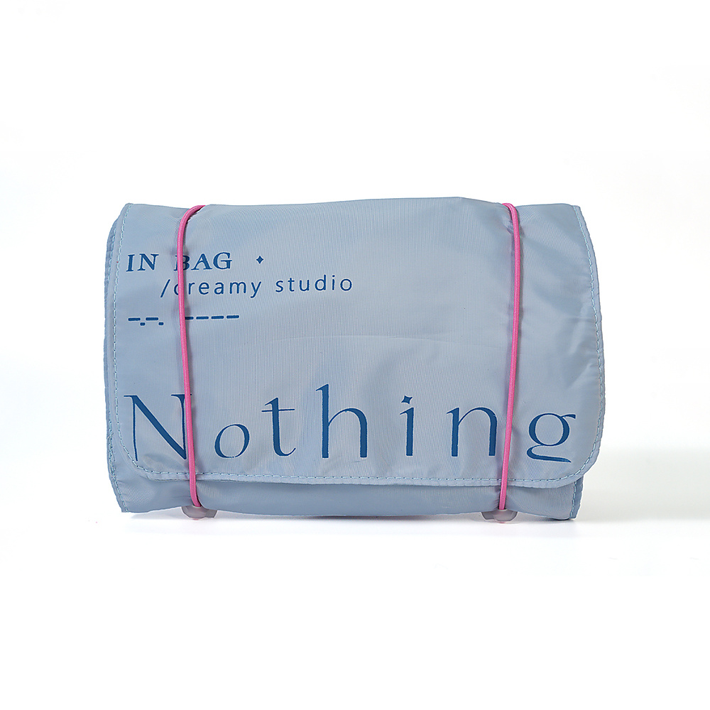 Compact, detachable, and hangable travel toiletry bag