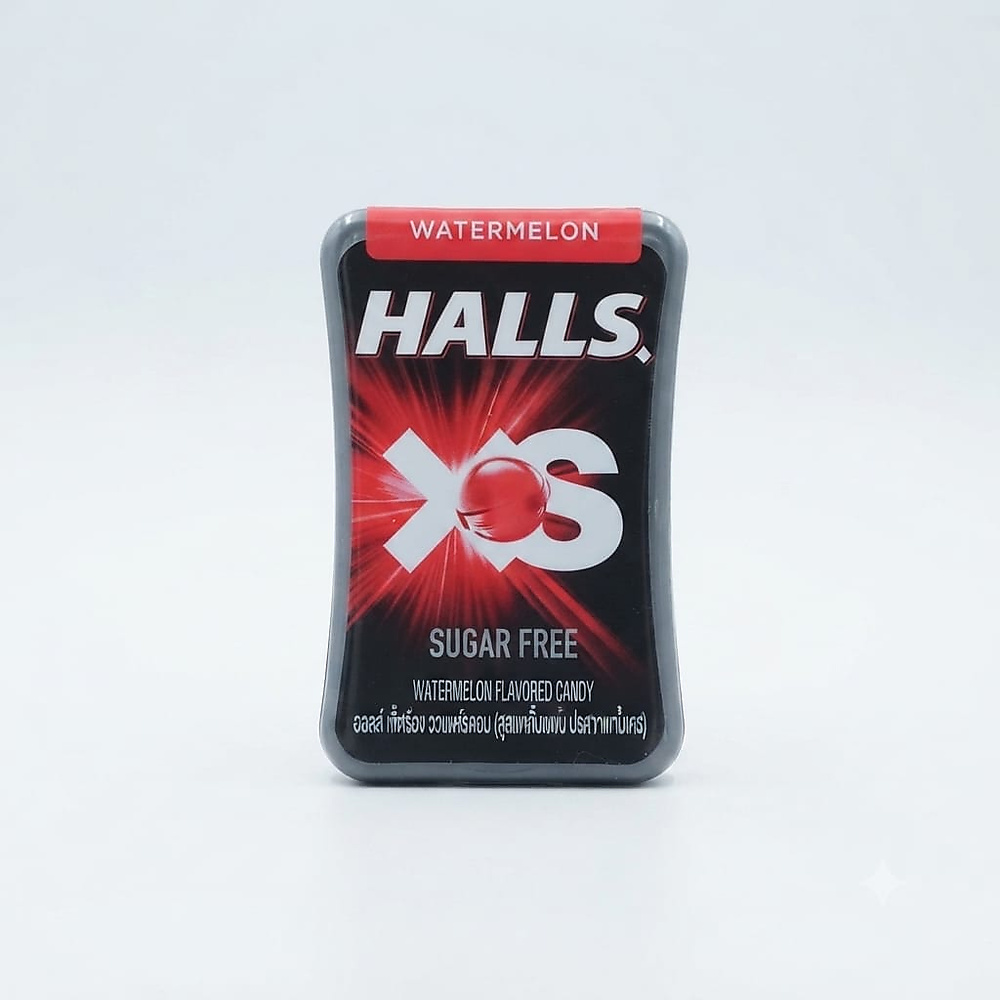 A tin of sugar-free Halls XS watermelon-flavored lozenges, a product from the famous "Halls" brand.