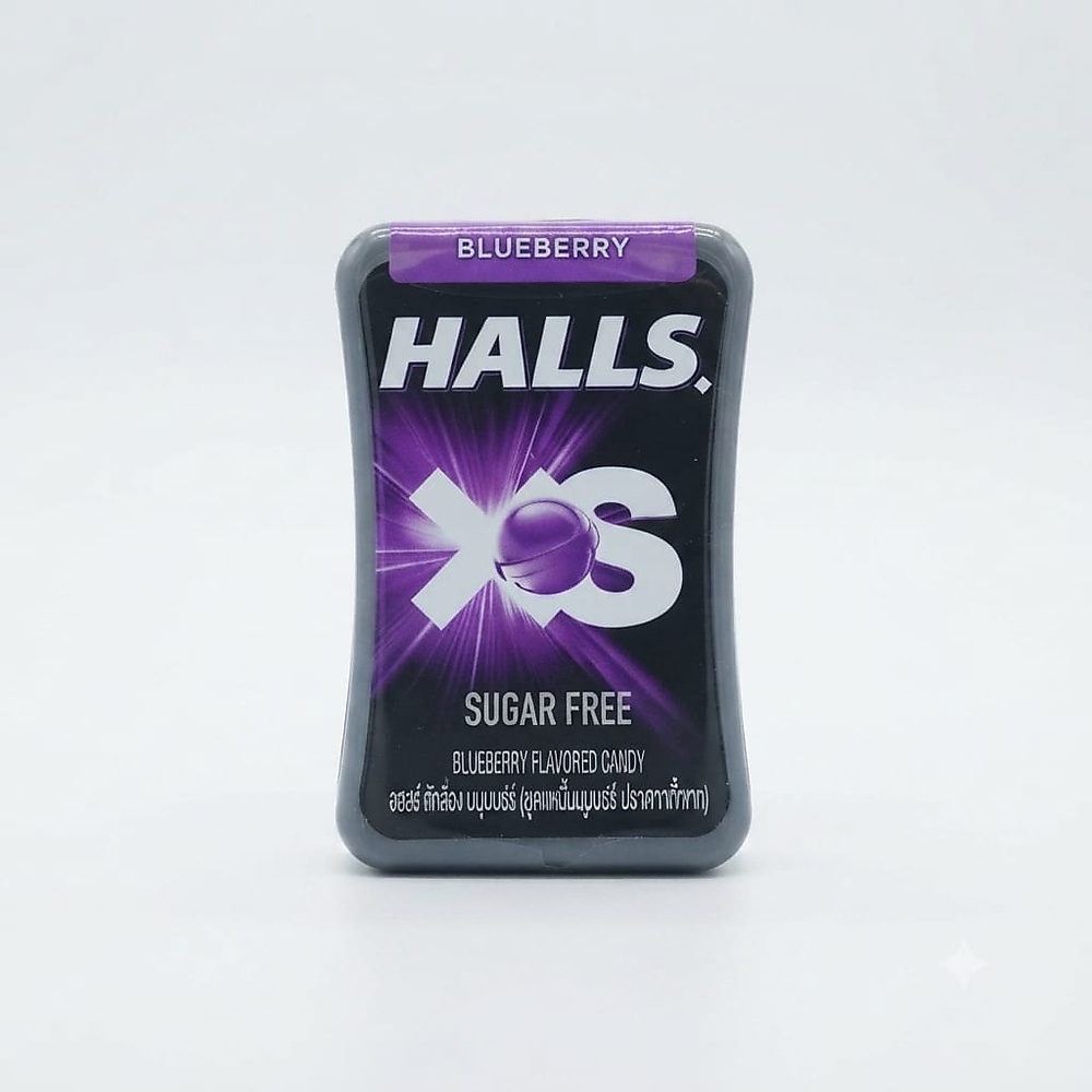 A tin of Halls XS Blue Raspberry—a sugar-free product from the famous Halls candy line.