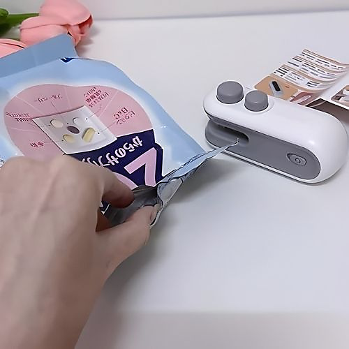 اداة إغلاق أكياس صغيرة مع قطاعة، أداة إغلاق أكياس طعام محمولة قابلة لإعادة الشحن وبتصميم جذب مغناطيس
