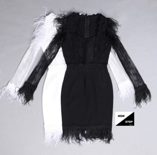 فستان باندج ابيض مع ريش