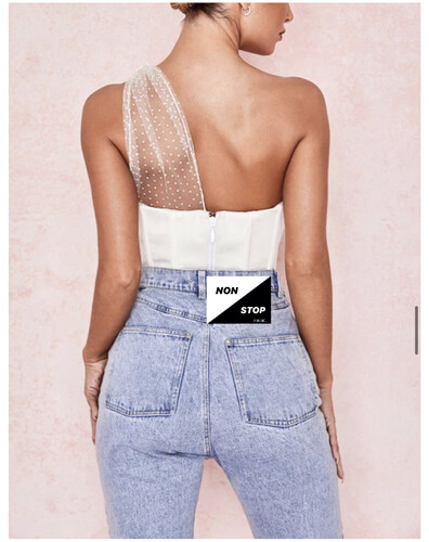 توب بكتف واحد لون ابيض