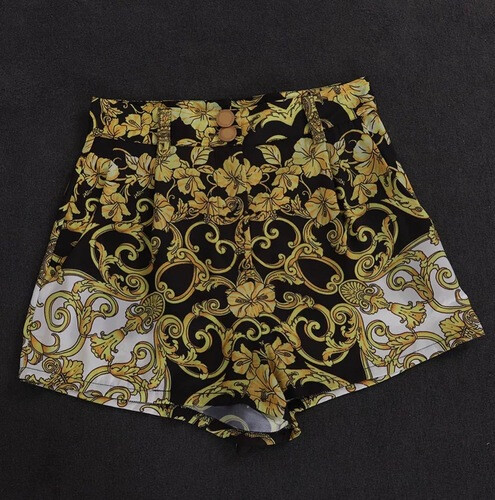 بدلة قطعتين شورت مع توب ستان