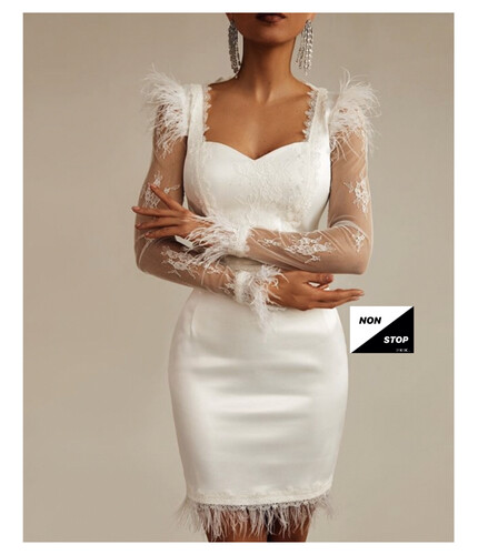 فستان باندج ابيض مع ريش