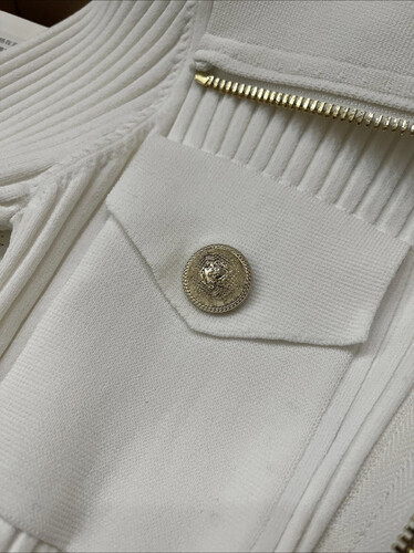 Knitting white blouse