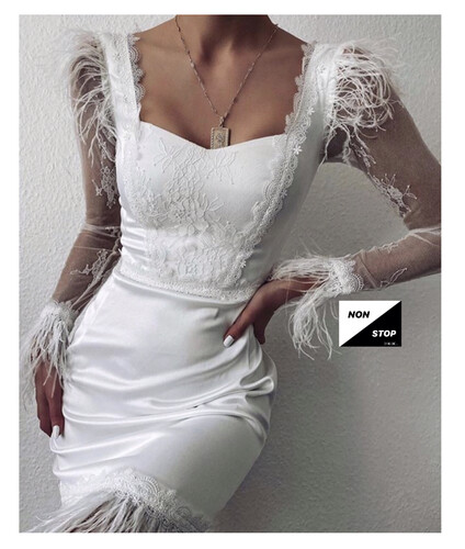 فستان باندج ابيض مع ريش