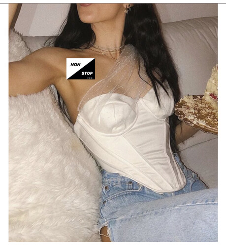 توب بكتف واحد لون ابيض