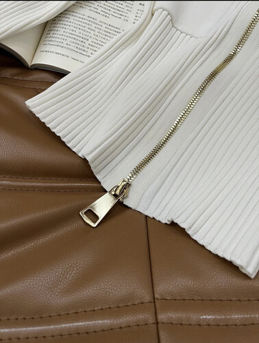 Knitting white blouse