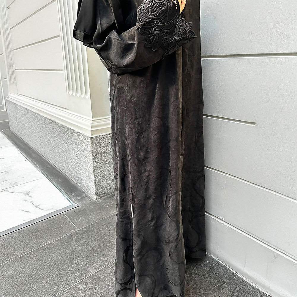 Harper Cobra fabric with a subtle textured pattern and trim detailing on the sleeves