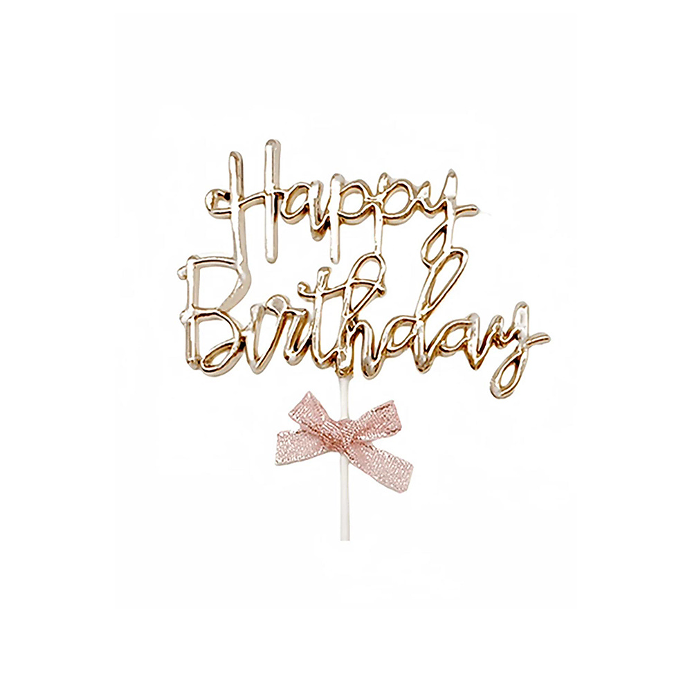 cake topper with “happy birthday”