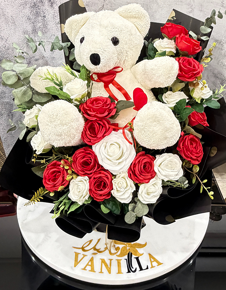 Bouquet Of Red And White Roses With A Teddy Bear