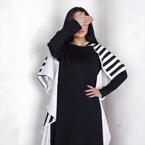 Black and white striped one-piece nappy
