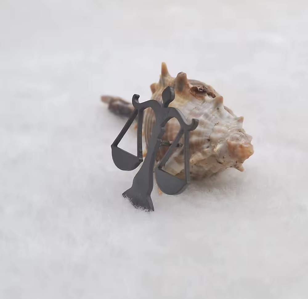 Law brooch
