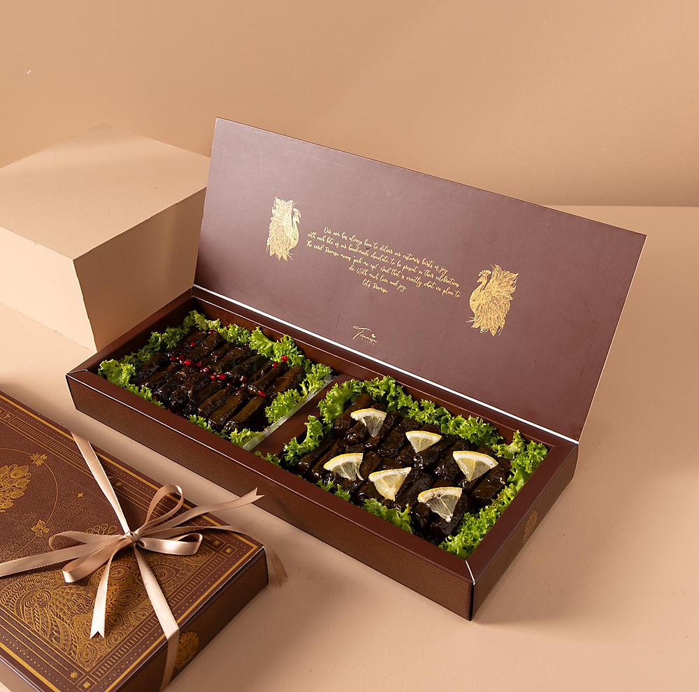 Brown box grape leaves lemon pomegranate