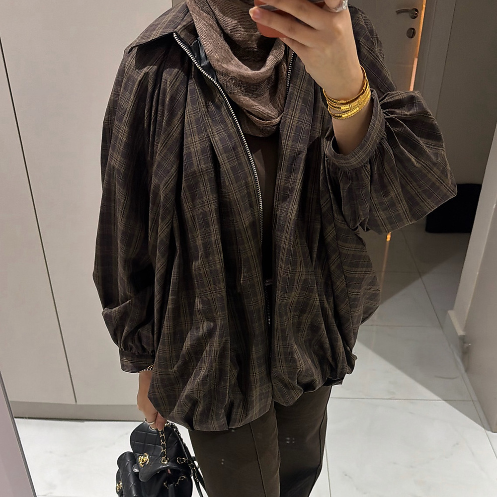 brown bomber jacket