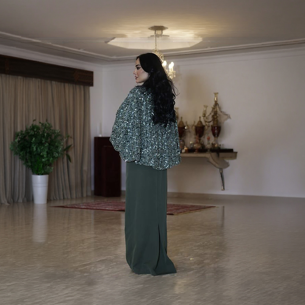 فستان كريب تركواز زيتي  وقماش مشكوك