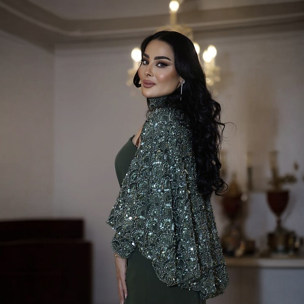 فستان كريب تركواز زيتي  وقماش مشكوك