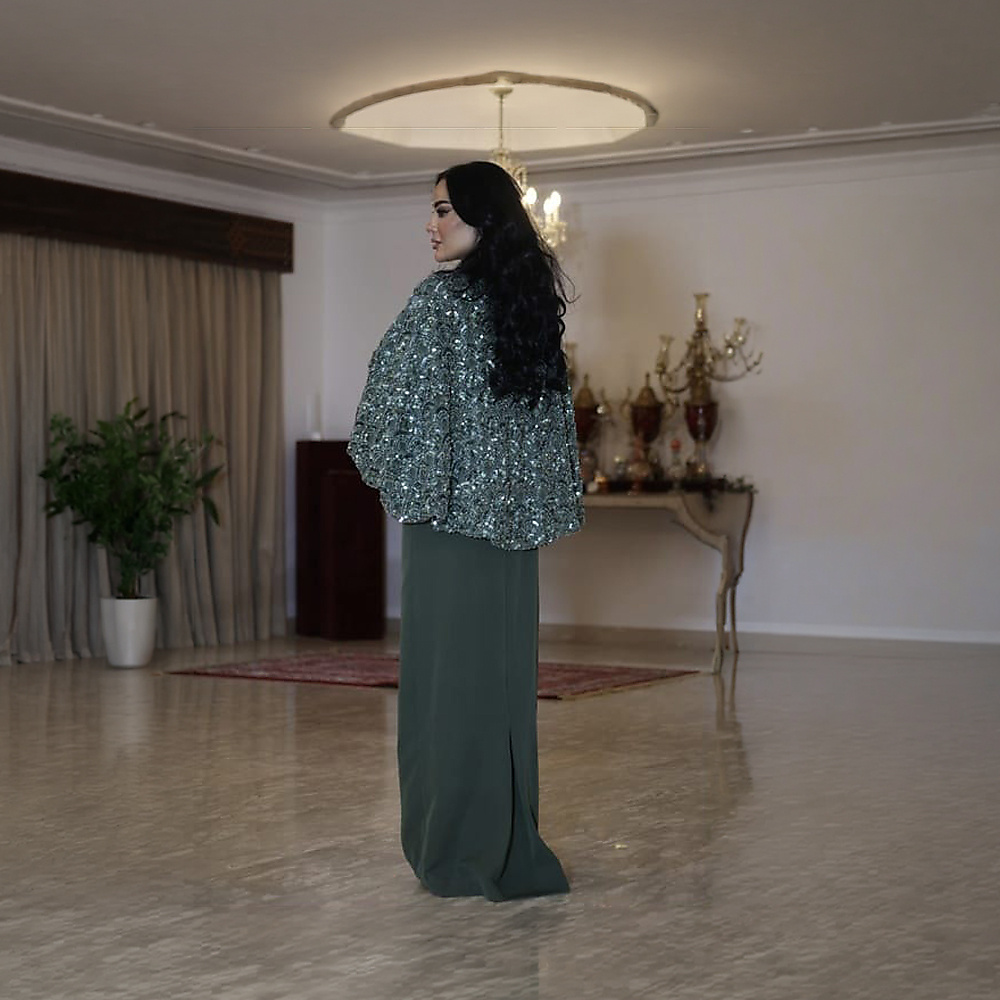 فستان كريب تركواز زيتي  وقماش مشكوك