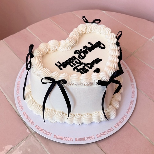 ivory heart black ribbons