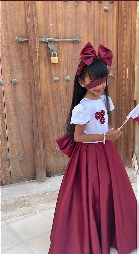 فستان العنابي الوطني