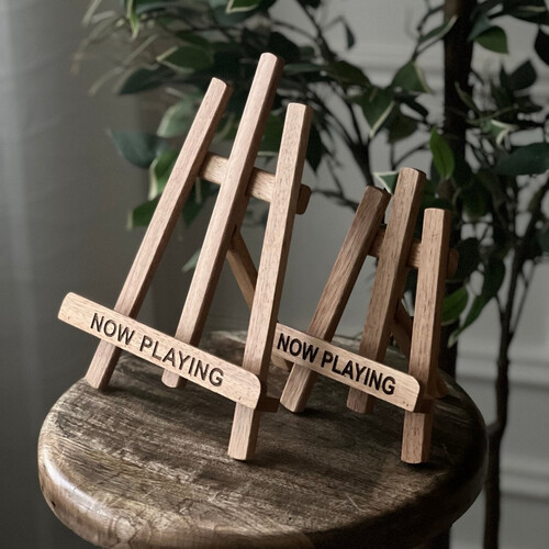 NOW PLAYING WOOD STAND
