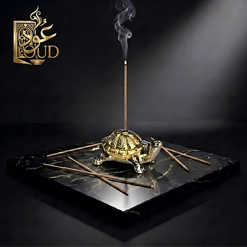 Small golden turtle-shaped incense holder