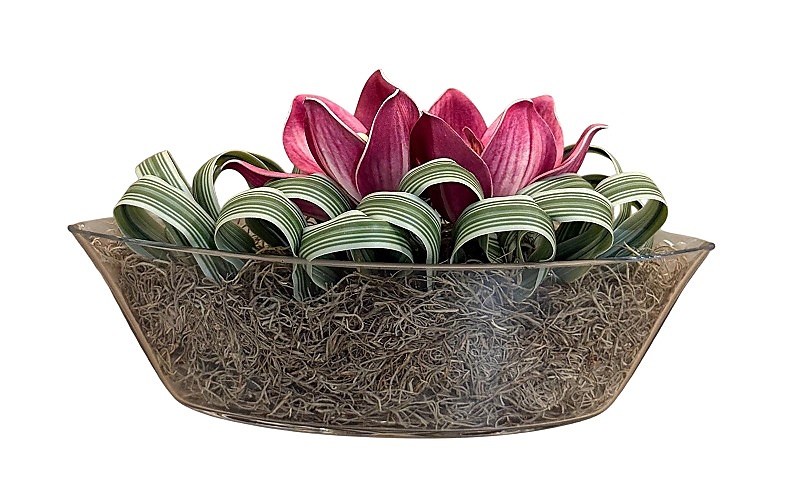 Artificial flower in glass vase