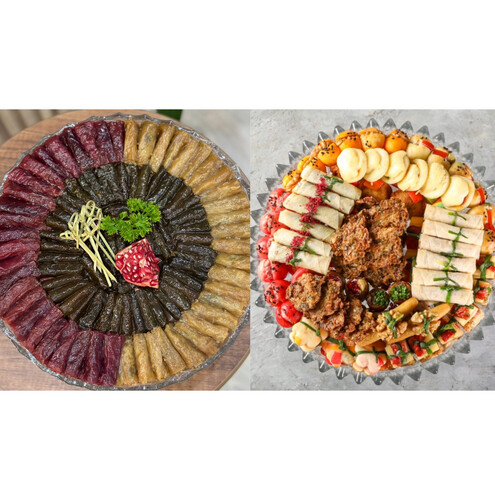 A crystal plate of grape leaves, a crystal tray of mixed fatayer and kebbeh A2