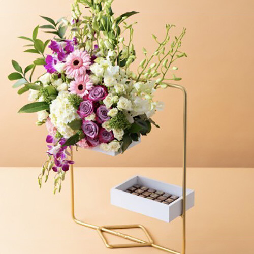 Stand With Flowers, Roses and Cocoa Pieces