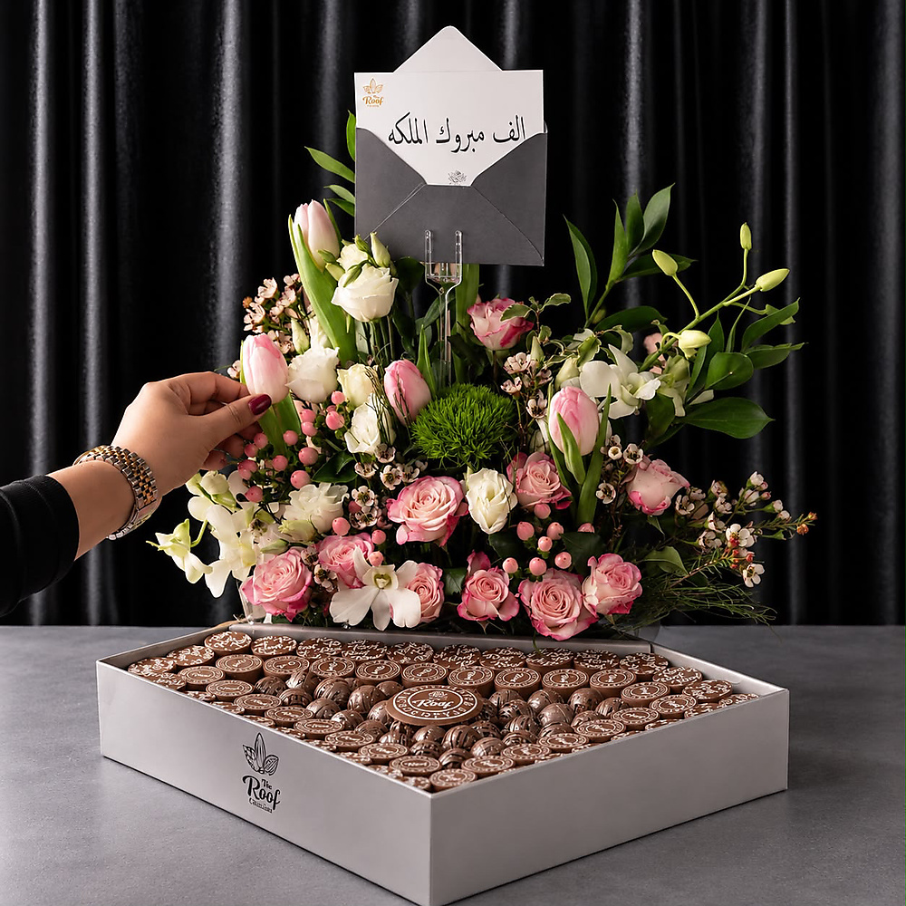 Cocoa The Roof with a natural rose arrangement 2