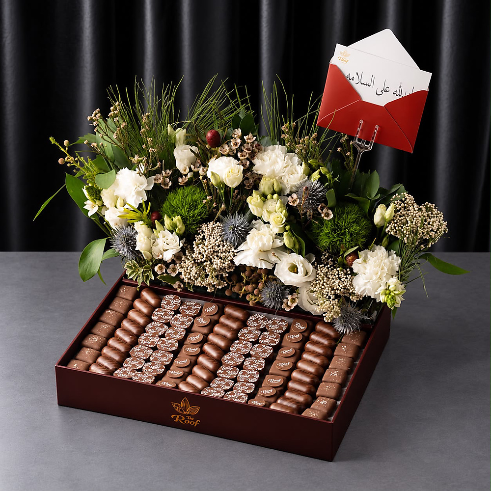 Cocoa The Roof with a natural rose arrangement 3