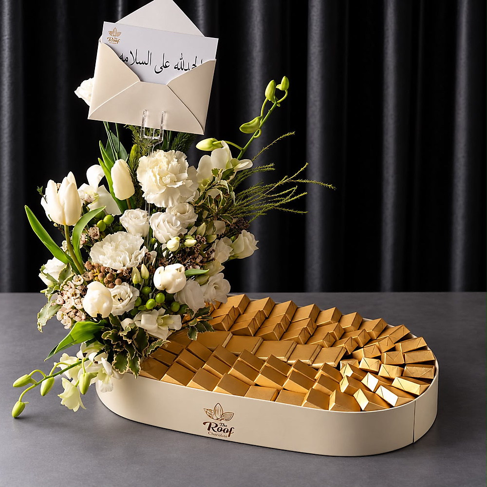 Cocoa The Roof with a natural rose arrangement 5