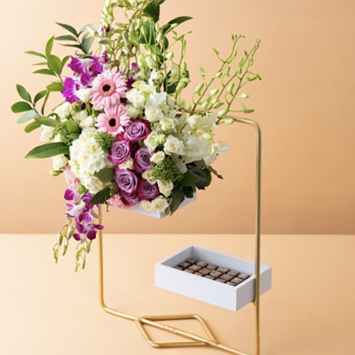 Stand With Flowers, Roses and Cocoa Pieces