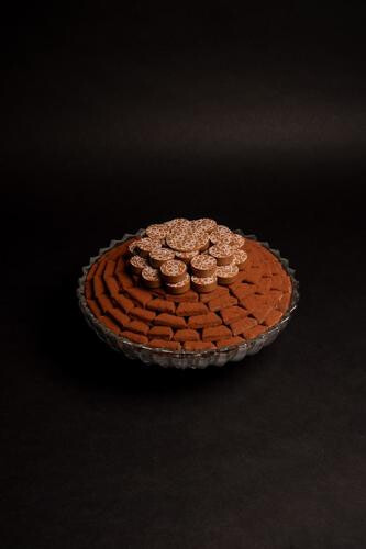 Crystal tray contains  Triangle Brownie 100 pieces - 1/4 kilo Hazelnut praline