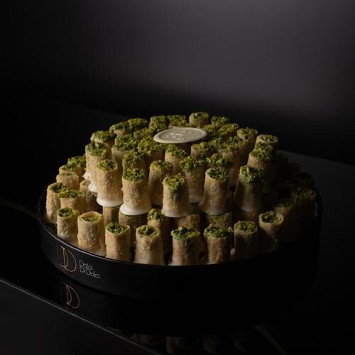 Black Tray contains  pieces of pistachio baklava