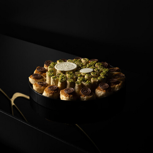 (Black Tray contains 62 pieces of baklava (15 Pieces of Cheesecake - 47 pieces Baklava Pistachio