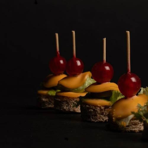 Crystal Tray contains 100 pieces of Mini Mwalah (tortila wraps : berries eqqplant - types of cheese