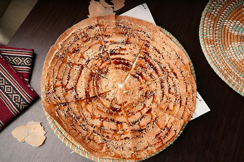 Saj Qursan with tahini and date molasses