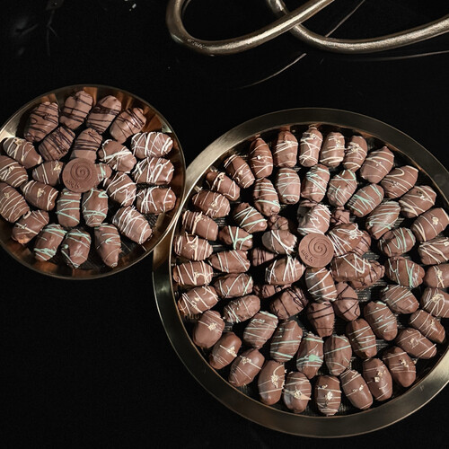 Stuffed Majdool dates covered in Belgian milk chocolate - Large plate