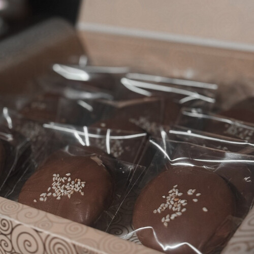 Chocolate Covered  Cookies stuffed with date,oats and seseme