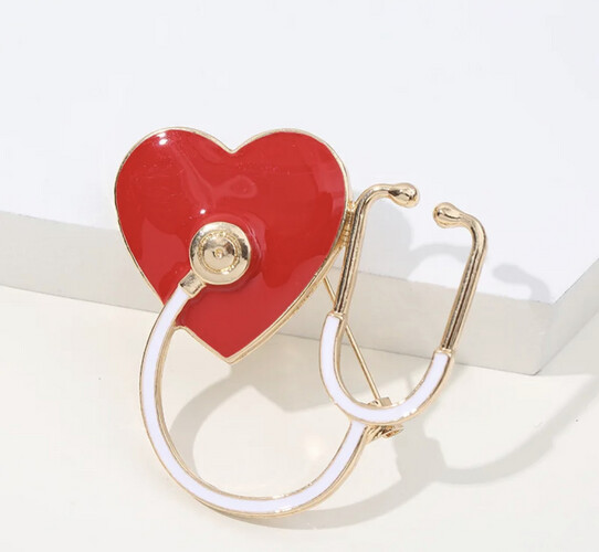 ‏STETHOSCOPE & HEART PIN.3