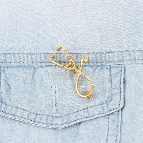 ‏STETHOSCOPE PIN - GOLD