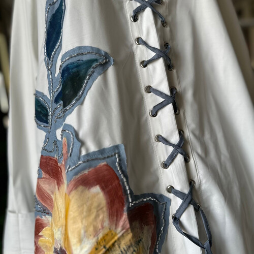 قميص الخيوط ازرق