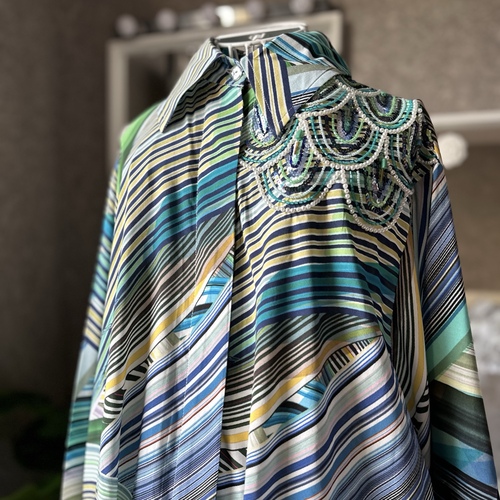 قميص اقواس الشك اخضر