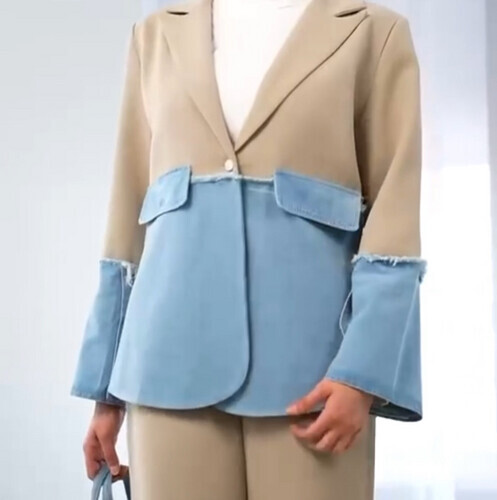 بدلة من قطعتين جاكيت بتفاصيل جينز مع بنطلون واسع أنيق، لإطلالة عصرية ومميزة